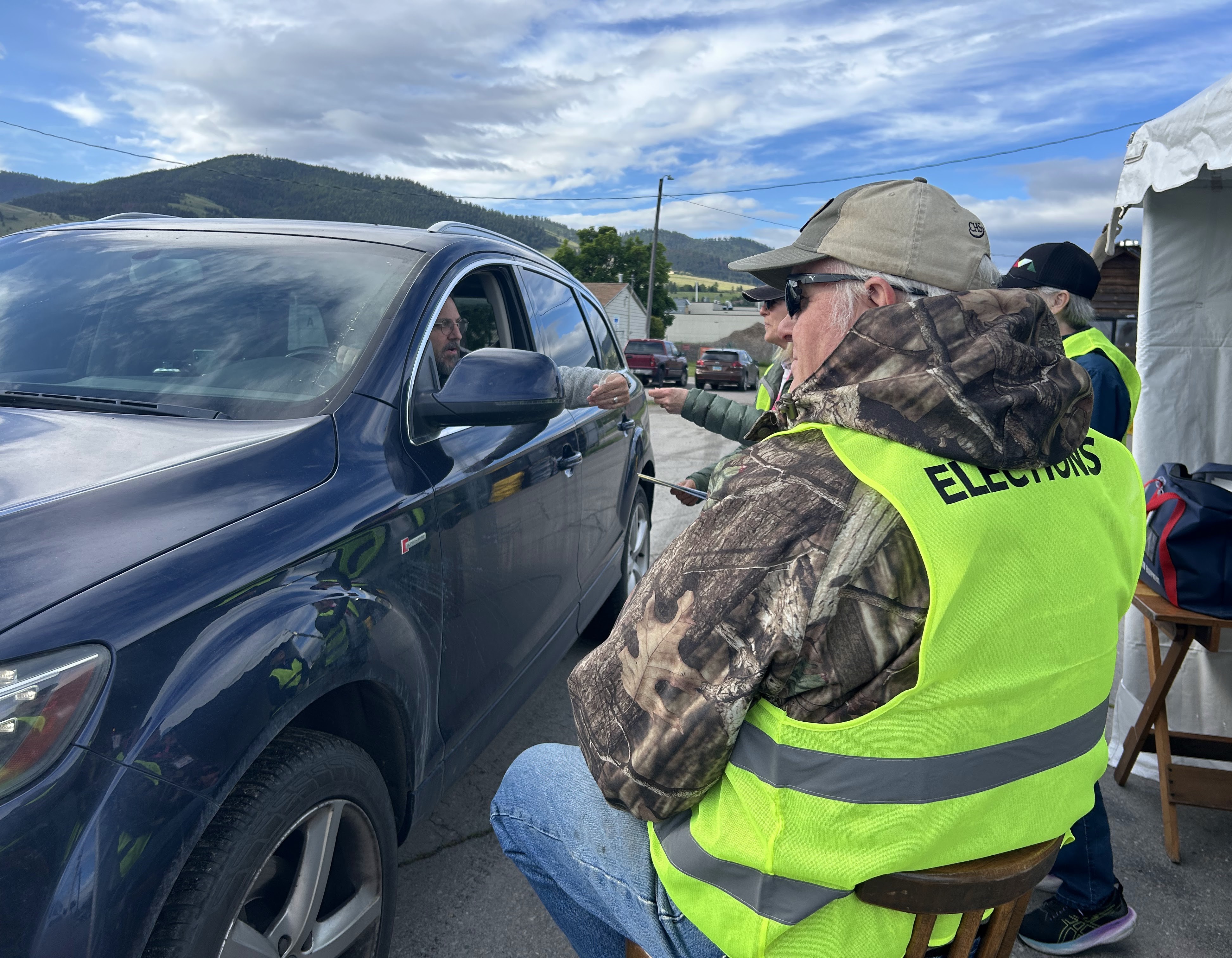 Voter Using A Drive Thru Ballot Drop Off